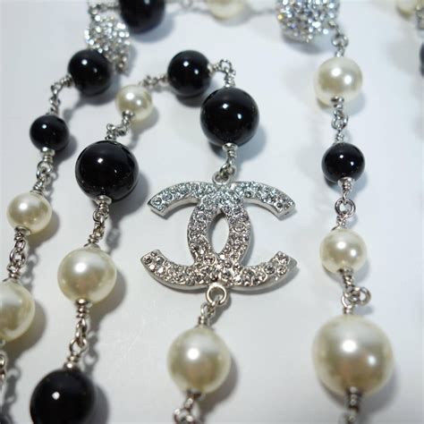 chanel necklace mens|Chanel black and white necklace.